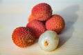 Some fresh lychees on a white cutting board Royalty Free Stock Photo