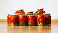 Some glass jars with marinated tomatoes homemade Royalty Free Stock Photo