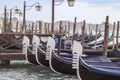 Some gondola are waiting on the canals grande