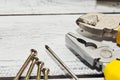 Some hand tools on wooden background