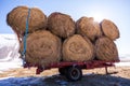 Some hay bales in the snow in Pian grande and Mount Vettore in the background, Castelluccio di Norcia, Umbria, Italy Royalty Free Stock Photo