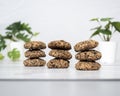 Healthy oatmeal hazelnut sesame peanut cookies in a bright kitchen