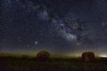 Milky way over the hay bales Royalty Free Stock Photo