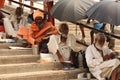 Some homeless people begging for food in the ganga river ghat india