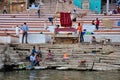 Locals hang out at a ghat in Varanasi, India.