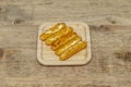 Some mozzarella sticks breaded and fried in deep fryer oil Royalty Free Stock Photo