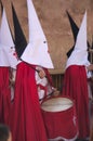 Some Nazarenes in the tamborrada of Holy Week