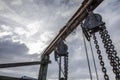 Hanging chains at the old dock Royalty Free Stock Photo