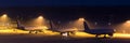 Passenger airplanes waiting on an aiport at night Royalty Free Stock Photo