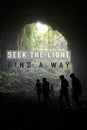 Some people came out of the big cave. Photos are equipped with quotes: seek the light, find a way Royalty Free Stock Photo
