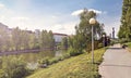 Some people relax at the pier of the Danube Canal located - Vienna