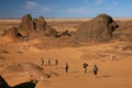 Some people walking in Sahara