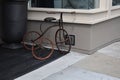 Antique child's tricycle becomes decorative art.