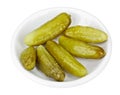 Some pickled cucumbers in white