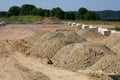 Sand hills on a construction site which is used as building material