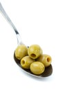 Some pitted green olives in the spoon Royalty Free Stock Photo