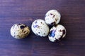 Some quail eggs on wooden top views