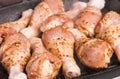 Some raw chicken drumstick on frying pan Royalty Free Stock Photo