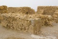 Some of the reconstructed ruins of the ancient Jewish clifftop fortress of Masada in Southern Israel. Everything below the marked Royalty Free Stock Photo