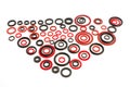 some red and black rings and black circles on a white background-