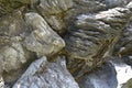 Some rock clusters with uneven rough surface under the midday sun and heat