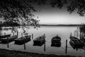 rowboats lie at a lake in the north of Germany in the morning in autumn Royalty Free Stock Photo