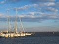 Some sailboats moored in the harbor of the town of Grado