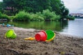 Some sand pails on beach Royalty Free Stock Photo