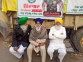 Sikh farmers are striking a pose for a group photograph