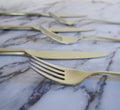 Some silver forks and knifes Royalty Free Stock Photo