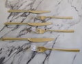 Some silver forks and knifes Royalty Free Stock Photo