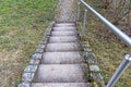 Stone stairs with a metal railing Royalty Free Stock Photo