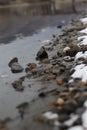 Stones near a lake during winter Royalty Free Stock Photo