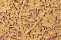 Some of the stucco pattern Thailand gold on a red background, Pu