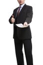 Some unrecognizable Businessman in suit showing a Spread of Pound Sterling Cash and thumb up Royalty Free Stock Photo