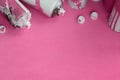 Some used pink aerosol spray cans and nozzles with paint drips lies on a blanket of soft and furry light pink fleece fabric. Class Royalty Free Stock Photo