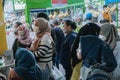 Some people are queueing in traditional market