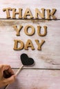 Wooden letters forming the text thank you day Royalty Free Stock Photo