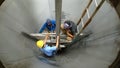 Some workers are working in tanks on construction projects Royalty Free Stock Photo