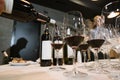 A somelier pours wine into the glass at the restaurant