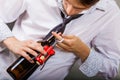 Somellier opening bottle with corkscrew. Royalty Free Stock Photo