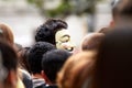 Anonymous in the middle of the crowd Royalty Free Stock Photo