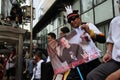 Someone carrying posters Indonesian president Joko Widodo