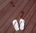 White beach slippers on the pool floor Royalty Free Stock Photo