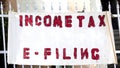 Shabby Income Tax Sign