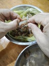 someone peeling raw fresh shrimp skin for its meat only. Royalty Free Stock Photo