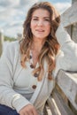 Sometimes fresh air is the best therapy. Portrait of a beautiful young woman relaxing outdoors. Royalty Free Stock Photo