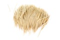 A somewhat orderly pile of toothpicks, isolated on white background