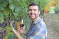 Sommelier enjoying red wine in vineyard Royalty Free Stock Photo