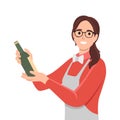 Sommelier holding glass bottle of old wine. Alcohol expert, woman bartender with elite luxury alcoholic drink in hand.
